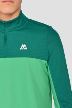 Junior Rush 1/4 Zip - Mountain Meadow/Deep Sea -Montirex RUSH 1 4 ZIP MOUNTAIN MEADOW DEEP SEA close logo